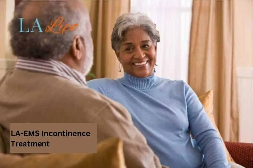 Couple sat smiling at each other - LA-EMS treatment Worcester Park