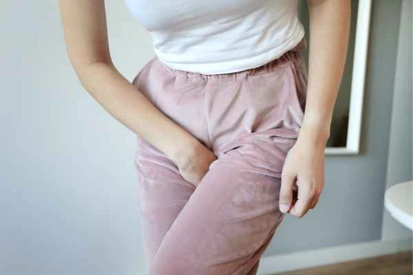 woman struggling with urine incontinence Worcester Park